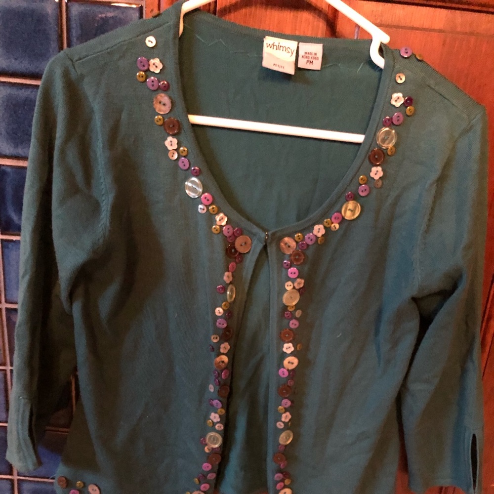Cute “whimsey” sweater with button accents